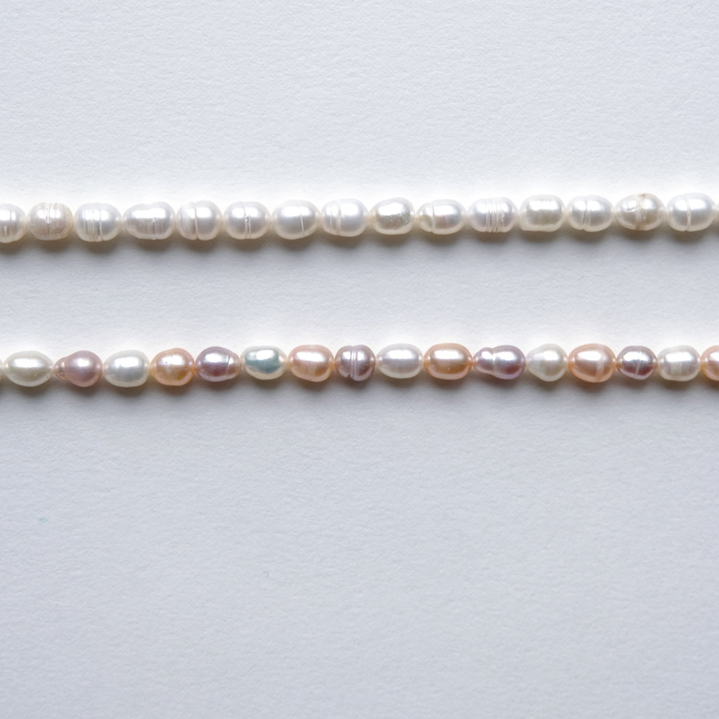 Long carbine oval pearls necklace